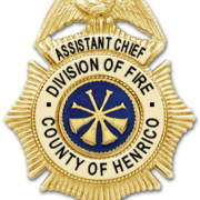 A digital image of a Henrico Fire Assistant Chief badge